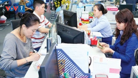 Kinh tế ngày 06/4/2015: Thu thuế xuất nhập khẩu qua ngân hàng thương mại – tiện ích và hiệu quả.