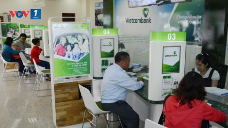 Vietcombank hạ lãi suất tất cả các khoản vay ngắn hạn về mức tối đa 6%/năm  (Thời sự đêm 15/10/2016)