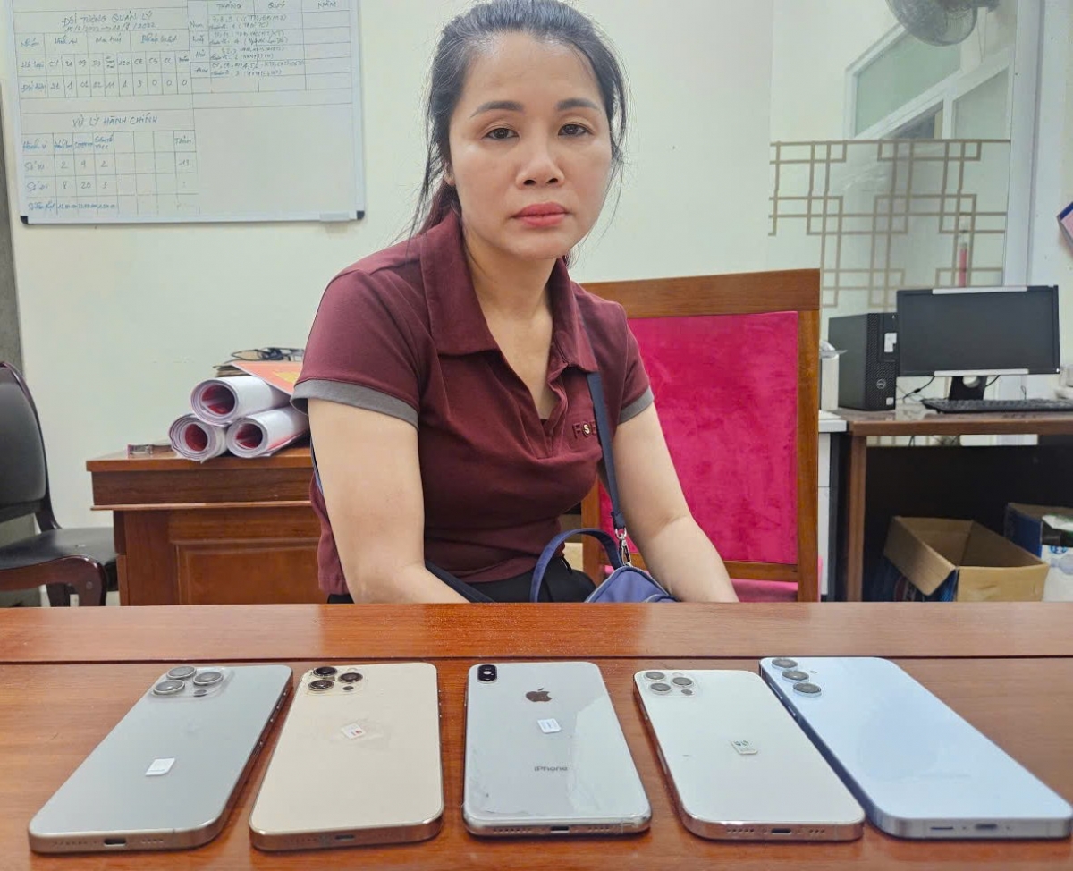 Trần Thị Nguyên và tang vật thu giữ trong vụ án.