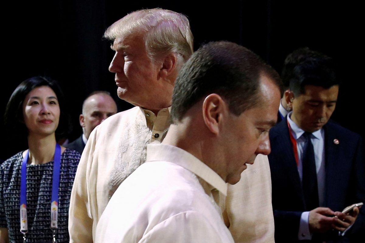 Tổng thống Mỹ Donald Trump và Phó Chủ tịch Hội đồng An ninh Liên bang Nga Dmitry Medvedev vừa có cuộc khẩu chiến trên mạng xã hội. Ảnh: REUTERS.