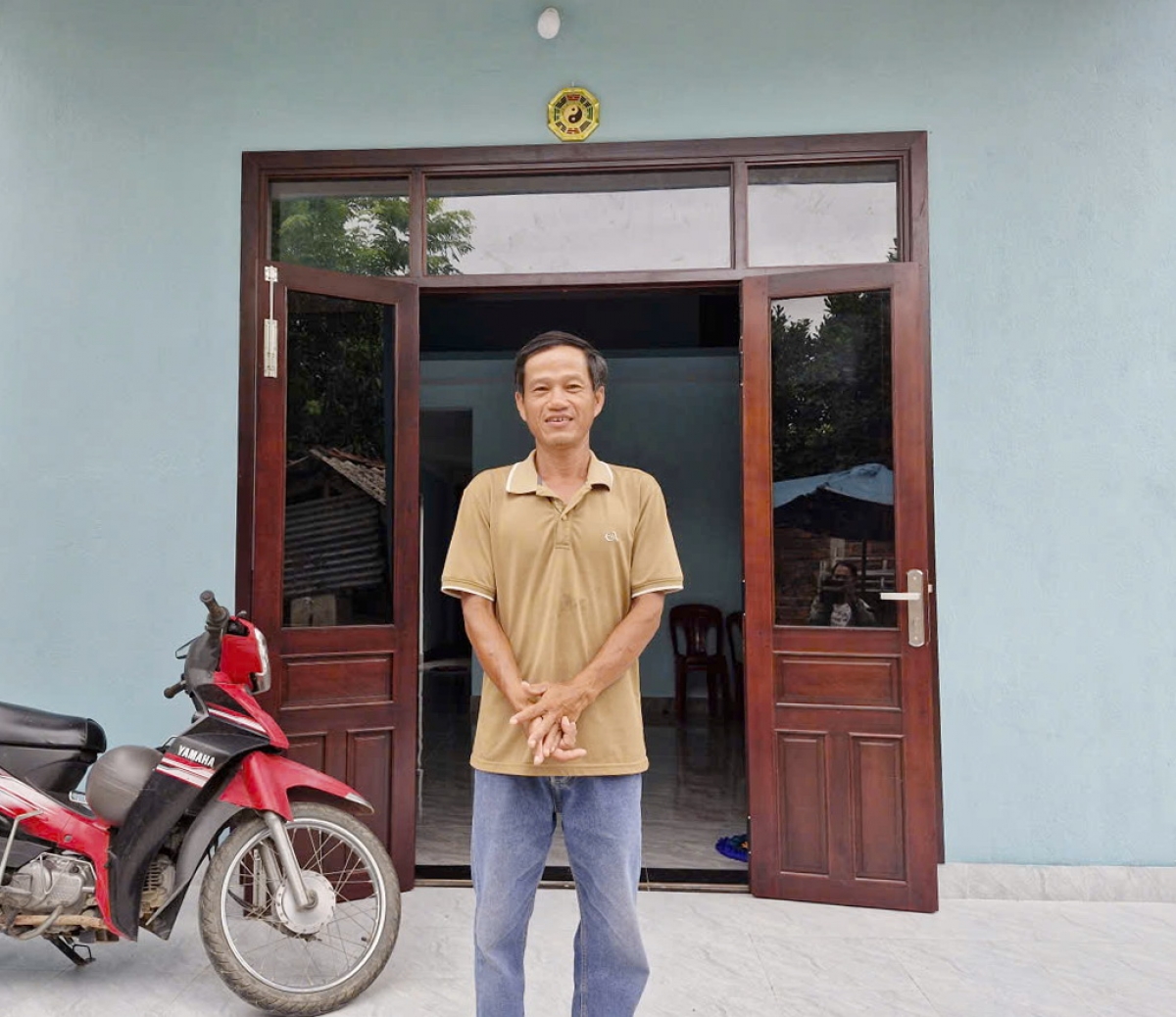 Ông Nguyễn Ngọc Nhiệm rất vui khi được ở trong ngôi nhà mới